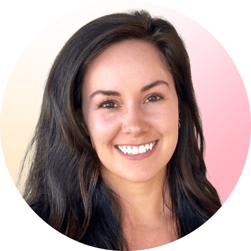 Circle-shaped professional headshot photo of Erin Hannon smiling in a pink background